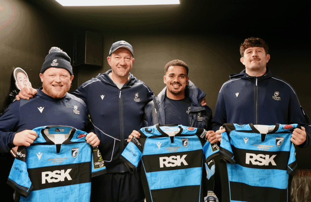 Coach Corniel Van Zyl with Ben Thomas, Keiron Assiratti and Rory Thornton ahead of their 100th appearance for Cardiff.
